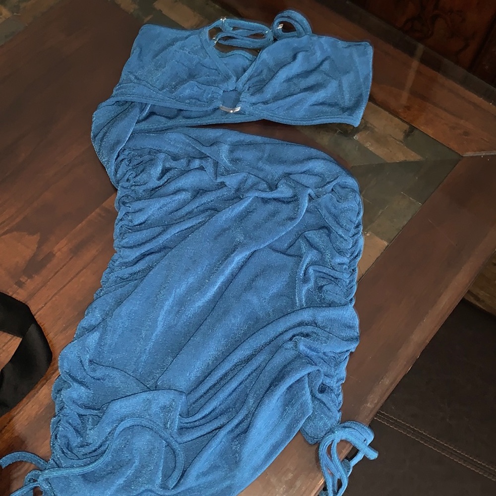 Blue dress. Open in middle